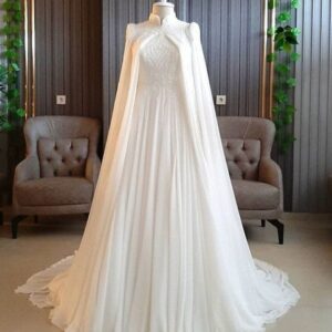 White wedding gown detailed with bugle beads