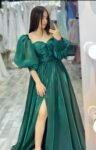 Green puff sleeved off the shoulder gown