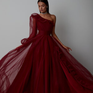 Scarlet one sleeved prom gown