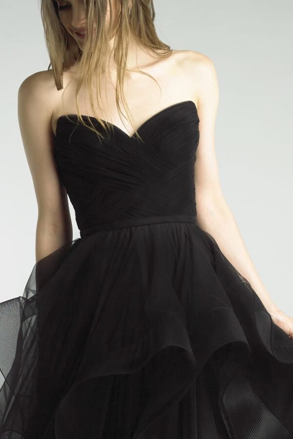 A-line black ruffled tulle floor-length gown.