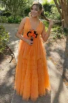 Plunge neckline ruffled prom outfit