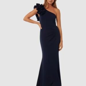 Dark blue outfit with blooming flower on a shoulder